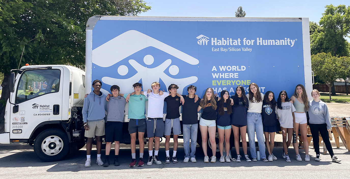 Students work on a Habitat for Humanity service project during MTerm 2023.