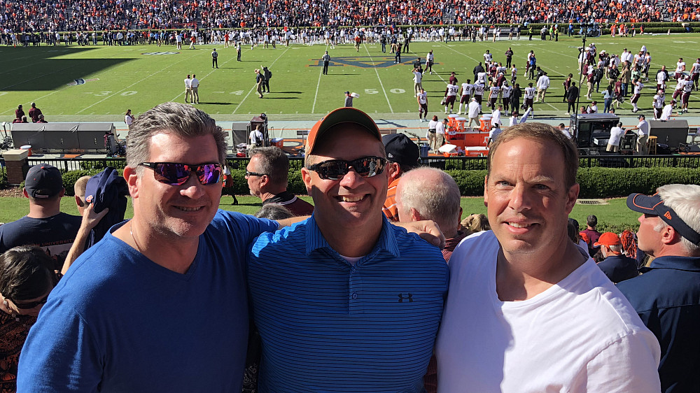 (Left to right) Scott Barkley '88, Jim Hoppe '88, and Bret Sokoloff '88 met at this year's Auburn-Texas A&M footb...