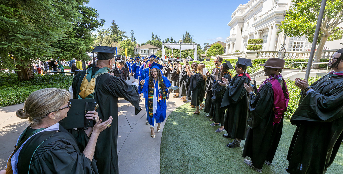 Menlo faculty members celebrate graduates during the 2023 commencement.