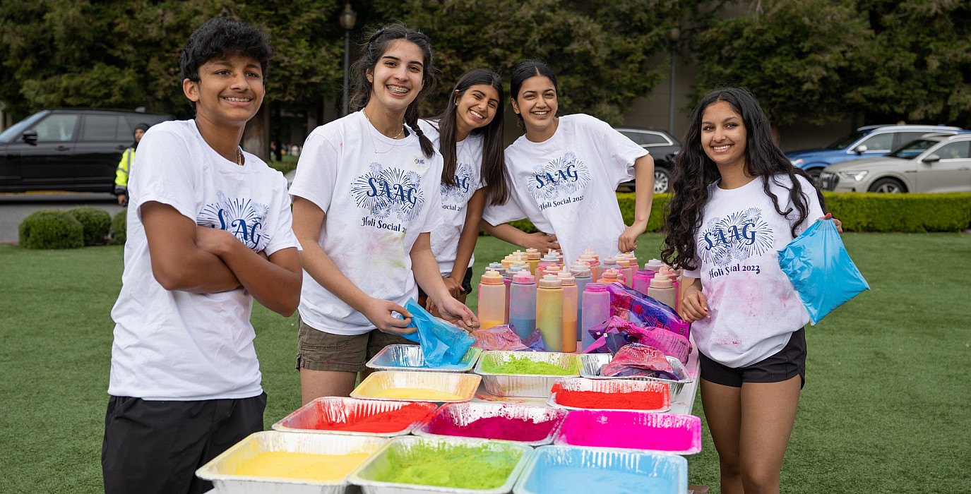 Members of the SAAG affinity Club host the Holi Social.