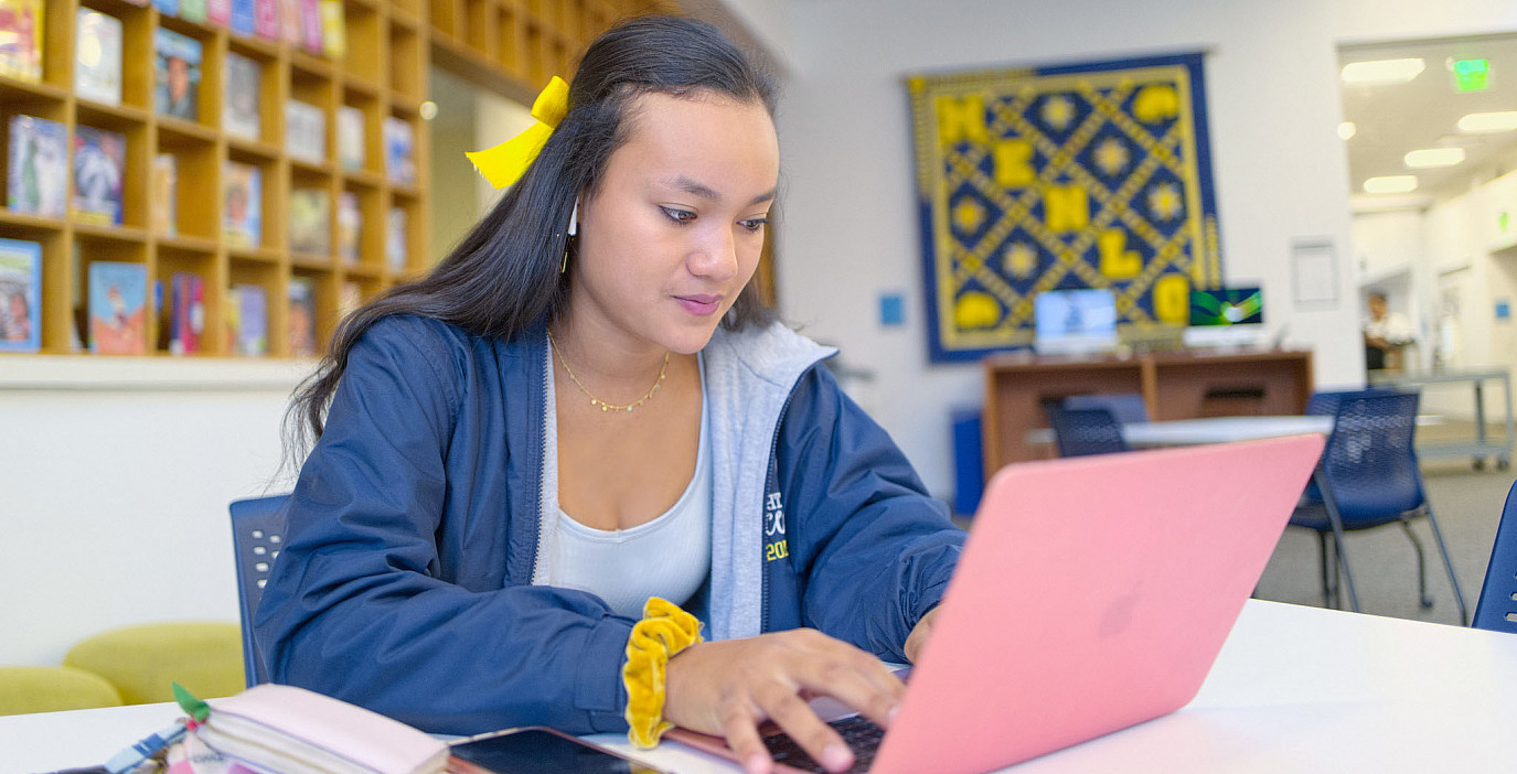 Upper School student studies independently in the Menlo School Library.