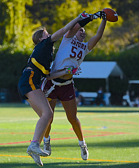 Menlo's Sophie Housser breaks up a pass against SHP on Monday