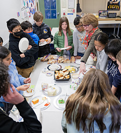 Vallerie Amzallag's 6th grade French students taste different varieties of cheese.