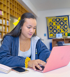 Upper School student studies independently in the Menlo School Library.