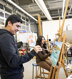 Students work on artwork in the Studio Art class.