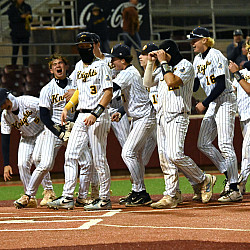 The Knights celebrate a walk-off single from senior right fielder Renner Barnett, left, in the ninth inning for a 7-6 win over Aptos in t...