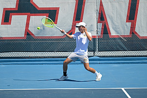 Menlo junior Lucas Huang sends a baseline drive