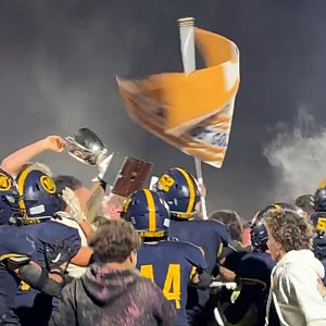 Menlo School players celebrate with fans after beating rival SHP 21-6 on Friday night