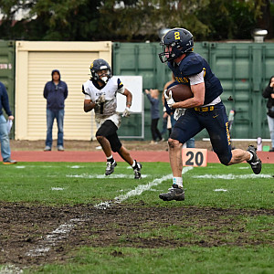 Menlo senior Trevor van der Pyl picks up a big gain on a reception against The King's Academy in Saturday's CCS quarterfinal