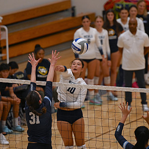 Menlo's Alex Fair delivers a kill against Crystal