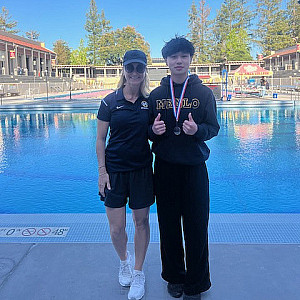Menlo freshman Nate Lee with coach Megan Parker.