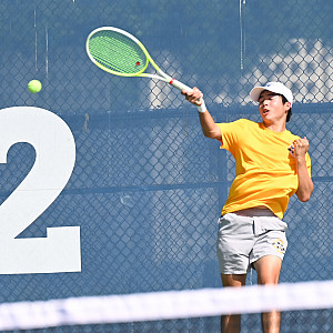 Menlo's Lucas Huang hits a return in a match against Los Gatos.