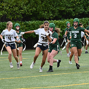 Menlo's Olivia Capasso gains yards after an interception