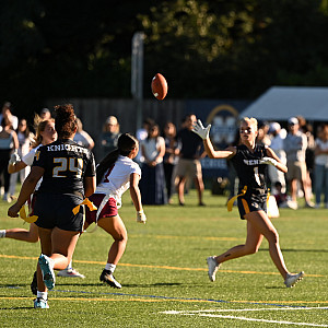 Menlo's Mary Mahe throws to fellow senior Ellie Knoll against Sacred Heart Prep at home Monday.
