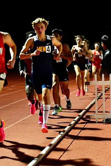 Menlo sophomore Landon Pretre broke a five-year-old school record in the 3200, with a time of 9:07.06 at the Dublin Distance Fiesta