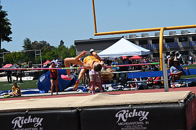 Summer Young set a school record in high jump, clearing 5 feet, 5 inches and breaking the previou...
