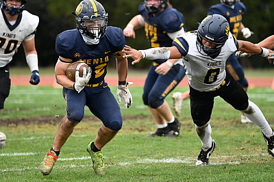 Menlo senior Chuck Wynn breaks through for a gain against TKA in the CCS quarterfinal