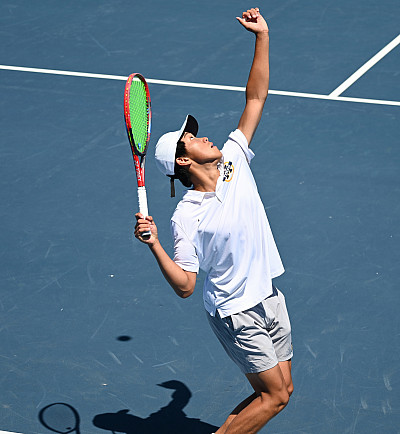 Menlo's No. 1 Yuanye Ma qinds up for a serve against Harvard Westlake in the state championship.