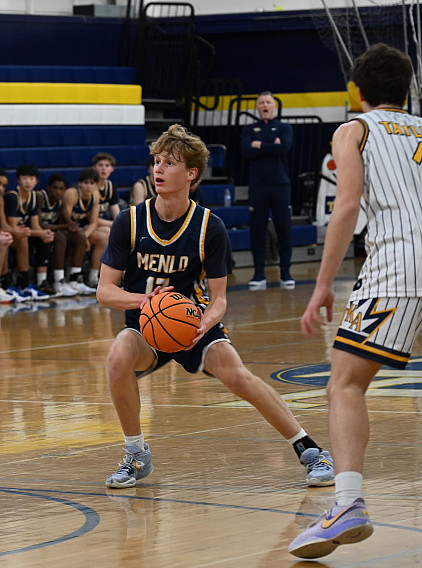 Tate Cohen looks for the shot against TKA