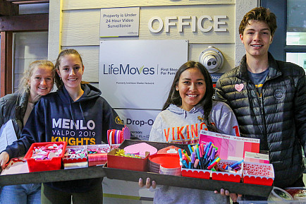 Students make valentine care packages for the local nonprofit Live Moves.