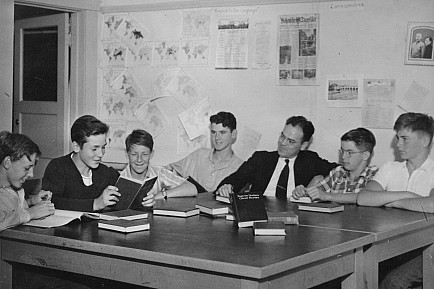 Archival Photo: Professor Holland Roberts leads the English faculty1940s