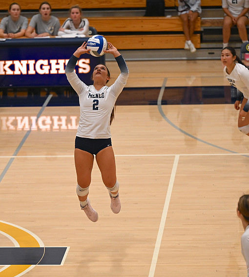 Menlo junior Jamie Johnson posted 21 assists, eight digs and three aces in Menlo's sweep of Crystal