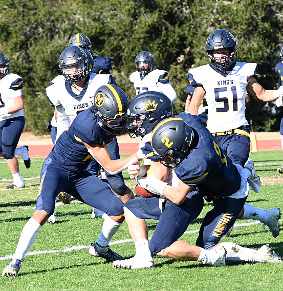 Menlo's Brady Jung, left, and Charlie King provided just as many big plays on defense as they did offense and special teams
