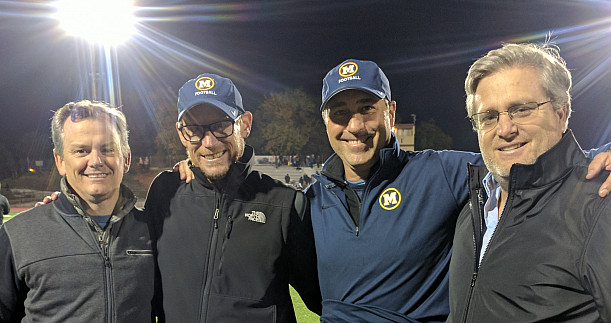 (Left to right) Ryan Enright '88, Jason Ward '88, Mark Newton '88, and Craig Weicker '88 meet at a Menlo playoff football game