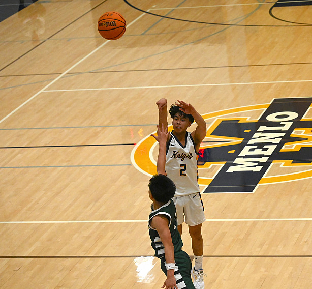 Knights seniot Evan Arcilla sank three three-pointers and finished with 11 points