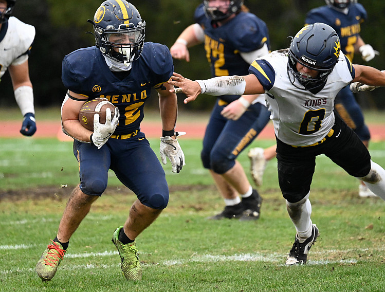 Menlo senior Chuck Wynn breaks through the line against TKA in a CCS quarterfinal