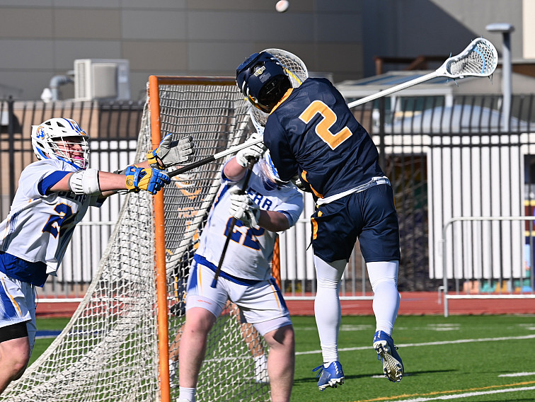 Menlo's Nicky Scacco, who had two goals and two assists, fires a shot in Thursday's WCAL game at Serra.