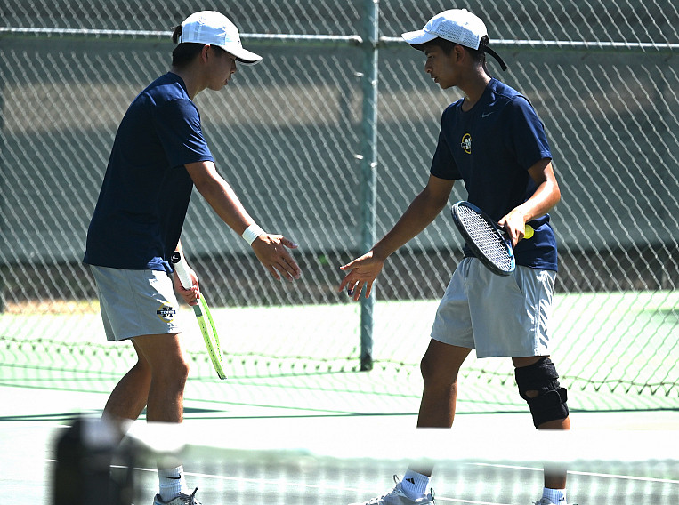 Sophomores Surya De Datta and Lucas Huang prevailed at No. 1 doubles against University