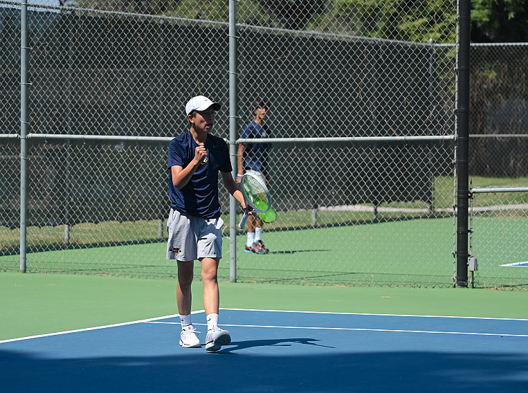 Freshman Riley Huang celebrates a point