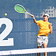 Menlo's Lucas Huang hits a return in a match against Los Gatos.