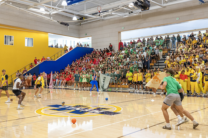 Students show their school spirit as the House System is announced.