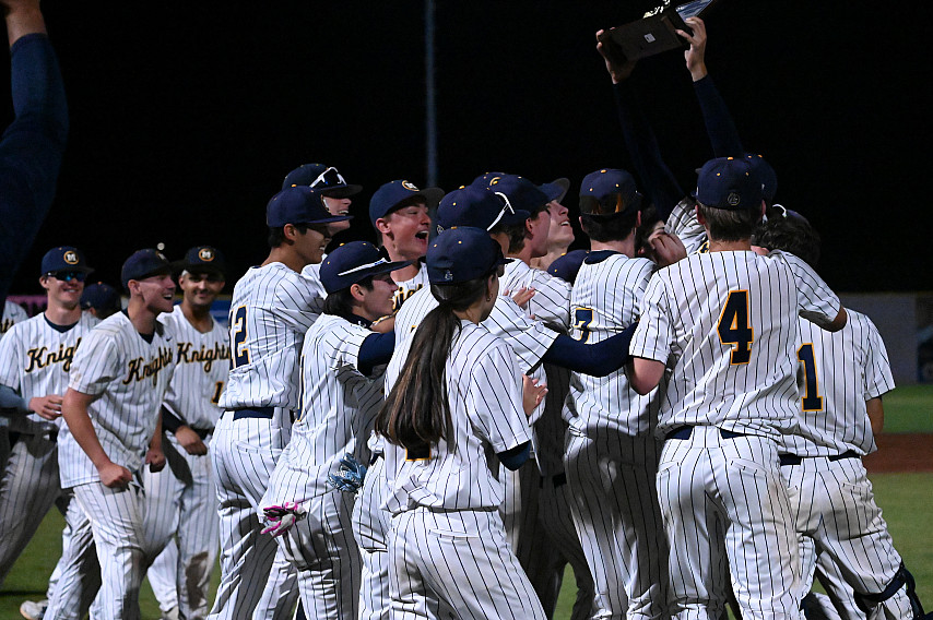 Menlo celebrates its CCS Div. V title at Excite Ballpark in San Jose.