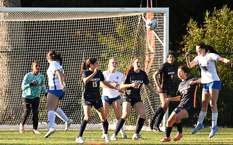 Menlo's defense works to get the ball out of the box against Terra Linda on Tuesday
